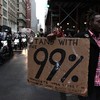 Occupy Wall Street protesters march through Soho.